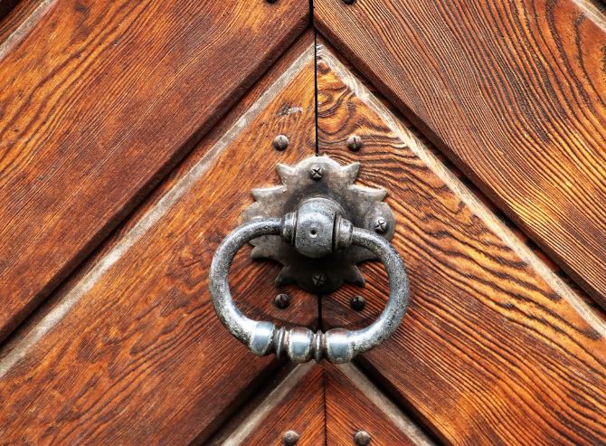 Dreaming of Knocking on a Door: 9 Meanings and Symbolisms